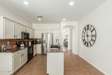 Welcome to this meticulously maintained 3-bedroom, 2-bathroom + on Estrella Mountain Ranch Golf Course in Arizona - for sale on GolfHomes.com, golf home, golf lot