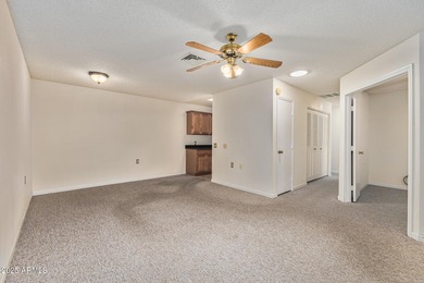 Discover an exceptional blend of privacy, comfort, and on Sun Village Golf Course in Arizona - for sale on GolfHomes.com, golf home, golf lot