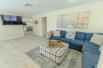 Coastal luxury meets resort-style living in this updated 3,000 on Gulf Harbors Golf Course in Florida - for sale on GolfHomes.com, golf home, golf lot