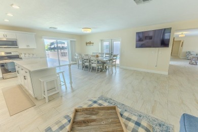 Coastal luxury meets resort-style living in this updated 3,000 on Gulf Harbors Golf Course in Florida - for sale on GolfHomes.com, golf home, golf lot