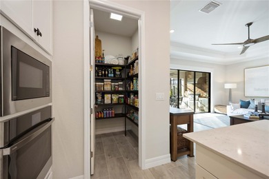 Under contract-accepting backup offers. Stunning Maria Model on Sarasota National Golf Club in Florida - for sale on GolfHomes.com, golf home, golf lot