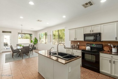 Welcome to this meticulously maintained 3-bedroom, 2-bathroom + on Estrella Mountain Ranch Golf Course in Arizona - for sale on GolfHomes.com, golf home, golf lot