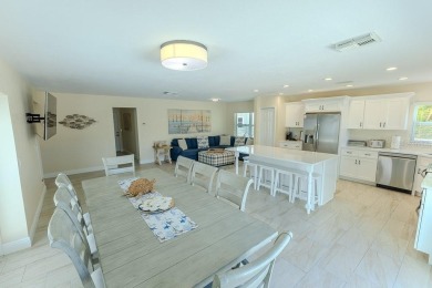 Coastal luxury meets resort-style living in this updated 3,000 on Gulf Harbors Golf Course in Florida - for sale on GolfHomes.com, golf home, golf lot
