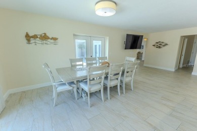 Coastal luxury meets resort-style living in this updated 3,000 on Gulf Harbors Golf Course in Florida - for sale on GolfHomes.com, golf home, golf lot