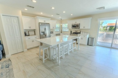 Coastal luxury meets resort-style living in this updated 3,000 on Gulf Harbors Golf Course in Florida - for sale on GolfHomes.com, golf home, golf lot