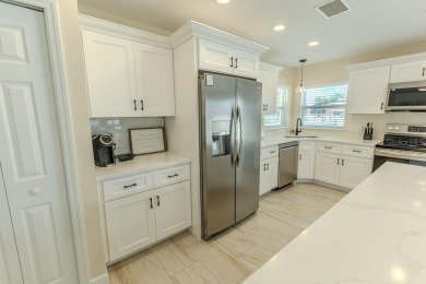 Coastal luxury meets resort-style living in this updated 3,000 on Gulf Harbors Golf Course in Florida - for sale on GolfHomes.com, golf home, golf lot