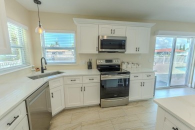 Coastal luxury meets resort-style living in this updated 3,000 on Gulf Harbors Golf Course in Florida - for sale on GolfHomes.com, golf home, golf lot