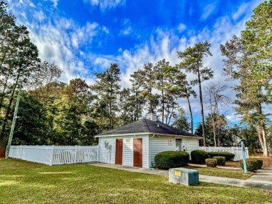 Nestled in the highly sought after Colonial Charters Golf Course on Palmetto Greens Golf and Country Club in South Carolina - for sale on GolfHomes.com, golf home, golf lot