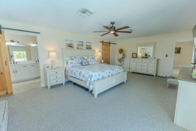 Coastal luxury meets resort-style living in this updated 3,000 on Gulf Harbors Golf Course in Florida - for sale on GolfHomes.com, golf home, golf lot
