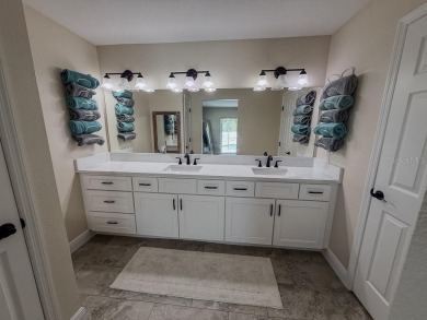 Coastal luxury meets resort-style living in this updated 3,000 on Gulf Harbors Golf Course in Florida - for sale on GolfHomes.com, golf home, golf lot