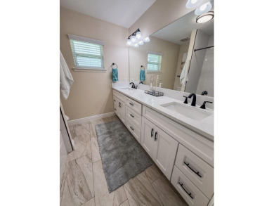 Coastal luxury meets resort-style living in this updated 3,000 on Gulf Harbors Golf Course in Florida - for sale on GolfHomes.com, golf home, golf lot