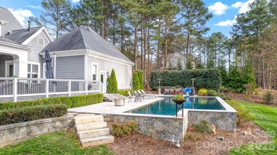 Gorgeous custom home loaded with luxury upgrades and exceptional on Trump National Golf Club Charlotte in North Carolina - for sale on GolfHomes.com, golf home, golf lot