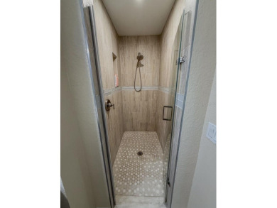 Coastal luxury meets resort-style living in this updated 3,000 on Gulf Harbors Golf Course in Florida - for sale on GolfHomes.com, golf home, golf lot