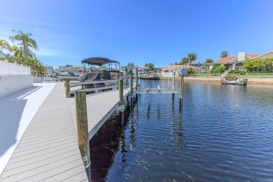 Coastal luxury meets resort-style living in this updated 3,000 on Gulf Harbors Golf Course in Florida - for sale on GolfHomes.com, golf home, golf lot