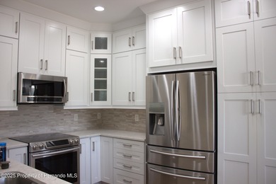 Welcome to this beautifully maintained 3-bedroom, 2-bathroom on Plantation Palms Golf Club in Florida - for sale on GolfHomes.com, golf home, golf lot