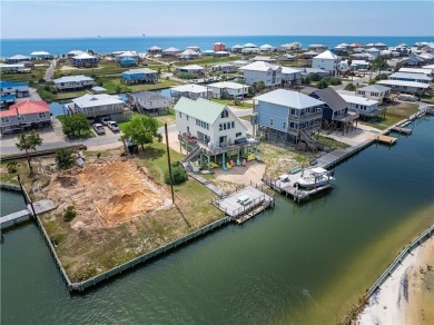 Charming Waterfront Oasis with Breathtaking Sunrises  Sunsets on Isle Dauphine Club Golf Course in Alabama - for sale on GolfHomes.com, golf home, golf lot