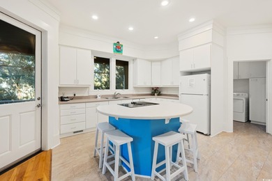 This fully-furnished beautiful home is in the ideal location on DeBordieu Country Club in South Carolina - for sale on GolfHomes.com, golf home, golf lot