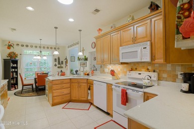 Tucked away on a quiet cul-de-sac in a prestigious gated golf on Brunswick Plantation and Golf Resorts in North Carolina - for sale on GolfHomes.com, golf home, golf lot
