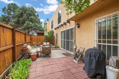 Welcome to your bright, 2-story, end-unit townhome in the Villa on Arroyo Del Oso Golf Course in New Mexico - for sale on GolfHomes.com, golf home, golf lot
