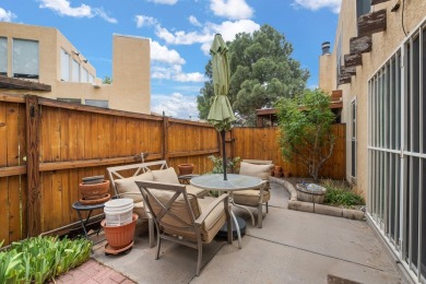 Welcome to your bright, 2-story, end-unit townhome in the Villa on Arroyo Del Oso Golf Course in New Mexico - for sale on GolfHomes.com, golf home, golf lot