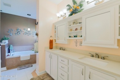 Tucked away on a quiet cul-de-sac in a prestigious gated golf on Brunswick Plantation and Golf Resorts in North Carolina - for sale on GolfHomes.com, golf home, golf lot