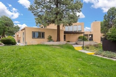 Welcome to your bright, 2-story, end-unit townhome in the Villa on Arroyo Del Oso Golf Course in New Mexico - for sale on GolfHomes.com, golf home, golf lot