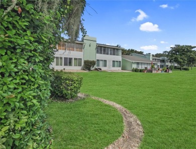 Charming Upstairs Condo with Golf Course  Greenway Views in Live on Country Club At Silver Springs Shores in Florida - for sale on GolfHomes.com, golf home, golf lot