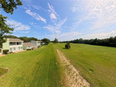 Charming Upstairs Condo with Golf Course  Greenway Views in Live on Country Club At Silver Springs Shores in Florida - for sale on GolfHomes.com, golf home, golf lot