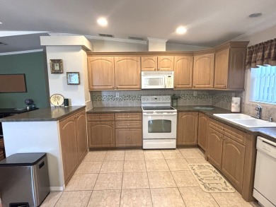 Listed by the Official Sales Team of Cypress Lakes Village on Big Cypress Golf and Country Club in Florida - for sale on GolfHomes.com, golf home, golf lot
