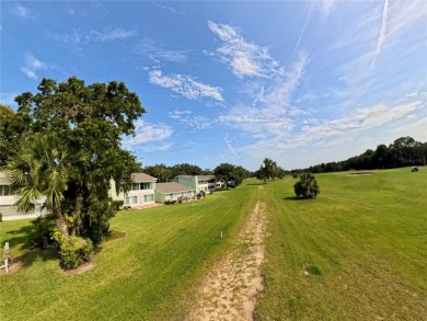 Charming Upstairs Condo with Golf Course  Greenway Views in Live on Country Club At Silver Springs Shores in Florida - for sale on GolfHomes.com, golf home, golf lot