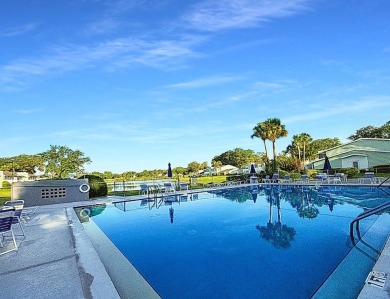Charming Upstairs Condo with Golf Course  Greenway Views in Live on Country Club At Silver Springs Shores in Florida - for sale on GolfHomes.com, golf home, golf lot