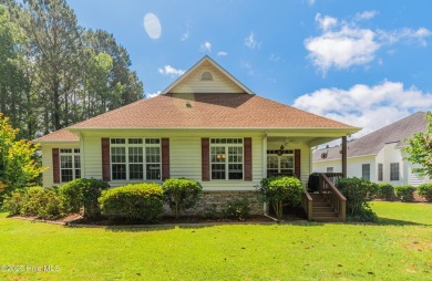 Tucked away on a quiet cul-de-sac in a prestigious gated golf on Brunswick Plantation and Golf Resorts in North Carolina - for sale on GolfHomes.com, golf home, golf lot