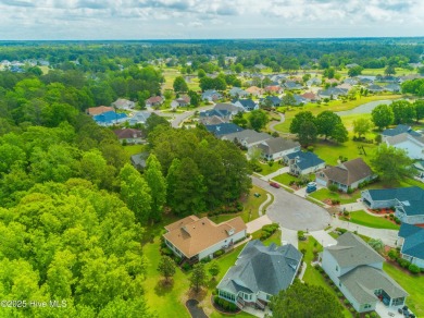 Tucked away on a quiet cul-de-sac in a prestigious gated golf on Brunswick Plantation and Golf Resorts in North Carolina - for sale on GolfHomes.com, golf home, golf lot