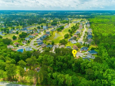 Tucked away on a quiet cul-de-sac in a prestigious gated golf on Brunswick Plantation and Golf Resorts in North Carolina - for sale on GolfHomes.com, golf home, golf lot