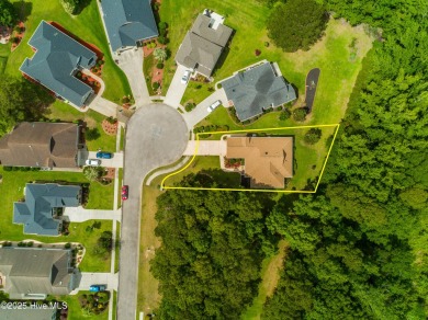 Tucked away on a quiet cul-de-sac in a prestigious gated golf on Brunswick Plantation and Golf Resorts in North Carolina - for sale on GolfHomes.com, golf home, golf lot