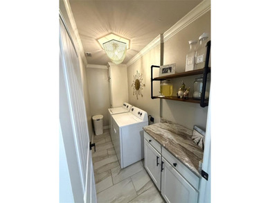 Step into a place where comfort meets possibility. This very on Hide-A-Way Lake Golf Course in Texas - for sale on GolfHomes.com, golf home, golf lot