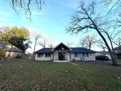 Step into a place where comfort meets possibility. This very on Hide-A-Way Lake Golf Course in Texas - for sale on GolfHomes.com, golf home, golf lot