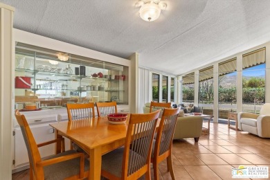 Dramatic mountain views enhance this open and light home behind on Date Palm Country Club in California - for sale on GolfHomes.com, golf home, golf lot