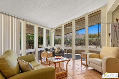 Dramatic mountain views enhance this open and light home behind on Date Palm Country Club in California - for sale on GolfHomes.com, golf home, golf lot