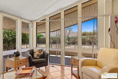 Dramatic mountain views enhance this open and light home behind on Date Palm Country Club in California - for sale on GolfHomes.com, golf home, golf lot