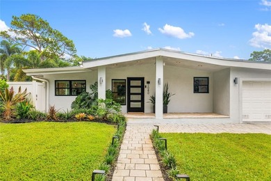 Beautiful 4-bed, 3-bath home in the Country Club Estates on Fort Lauderdale Country Club in Florida - for sale on GolfHomes.com, golf home, golf lot