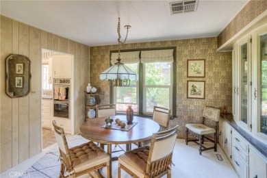 The wet bar features elegant finishes and modern fixtures that on Lake Oroville Golf and Event Center in California - for sale on GolfHomes.com, golf home, golf lot