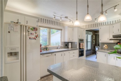 The wet bar features elegant finishes and modern fixtures that on Lake Oroville Golf and Event Center in California - for sale on GolfHomes.com, golf home, golf lot