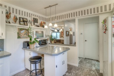 The wet bar features elegant finishes and modern fixtures that on Lake Oroville Golf and Event Center in California - for sale on GolfHomes.com, golf home, golf lot