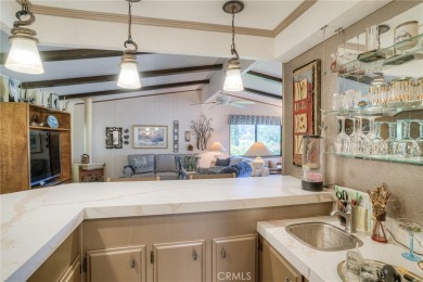 The wet bar features elegant finishes and modern fixtures that on Lake Oroville Golf and Event Center in California - for sale on GolfHomes.com, golf home, golf lot