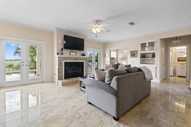 Live Where Everyday Feels Like A Vacation! Discover The Peaceful on Marsh Creek Country Club in Florida - for sale on GolfHomes.com, golf home, golf lot