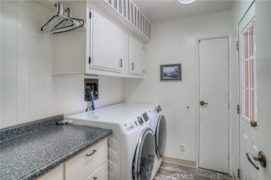 The wet bar features elegant finishes and modern fixtures that on Lake Oroville Golf and Event Center in California - for sale on GolfHomes.com, golf home, golf lot