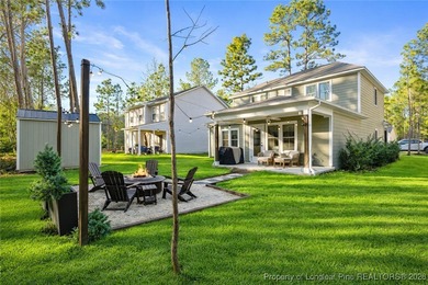 Welcome home to this well-maintained 4-bedroom, 2.5-bath on Woodlake Country Club in North Carolina - for sale on GolfHomes.com, golf home, golf lot