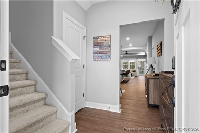 Welcome home to this well-maintained 4-bedroom, 2.5-bath on Woodlake Country Club in North Carolina - for sale on GolfHomes.com, golf home, golf lot