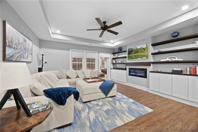 Welcome home to this well-maintained 4-bedroom, 2.5-bath on Woodlake Country Club in North Carolina - for sale on GolfHomes.com, golf home, golf lot